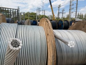 ACSR and AAAC overhead conductors on export cable drums for power line projects