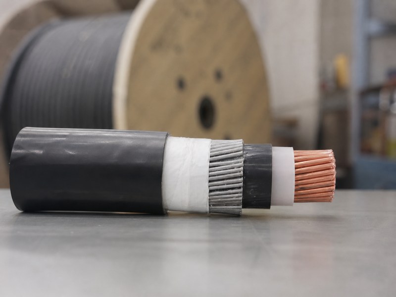 Prepared medium voltage cable end on a factory inspection bench for termination review