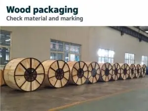 Wooden reel reference photograph with a reminder to check packaging material and marking